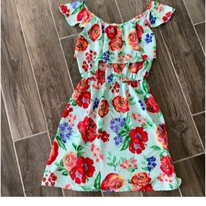 Everly Boutique Dress one small snag on front ruffle
